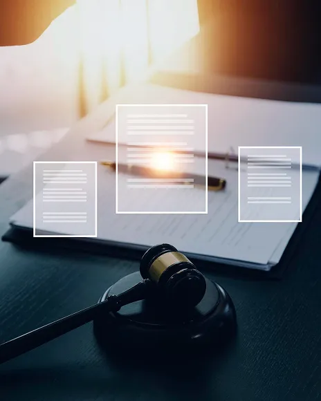 Gavel and laptop on a desk, representing a legal removal request