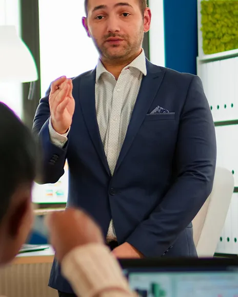 Founder presenting to colleagues, representing investor credibility